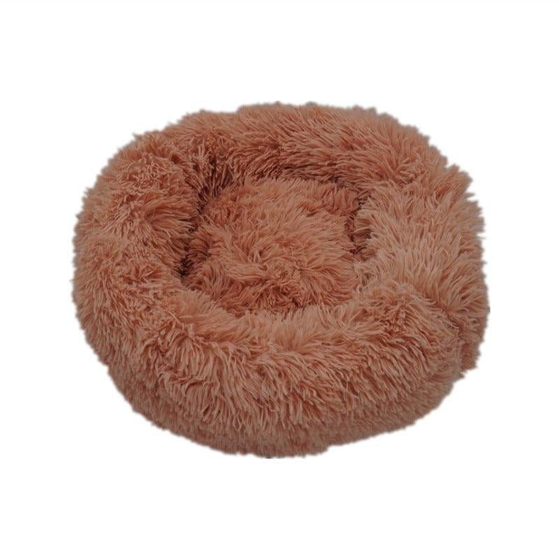 Ultra-soft brown calming donut bed for dogs and cats to relax and sleep comfortably