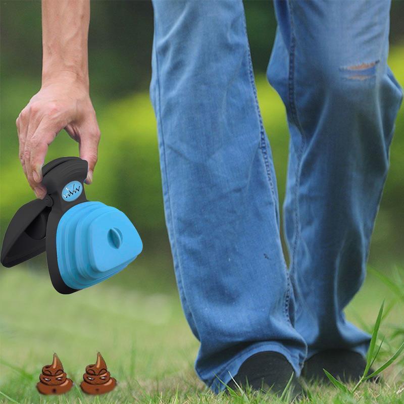 Dog poop scooper being used outdoors for hygienic pet waste cleanup