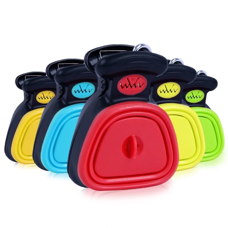 Dog poop scoopers in yellow, blue, red, orange, and green displayed together