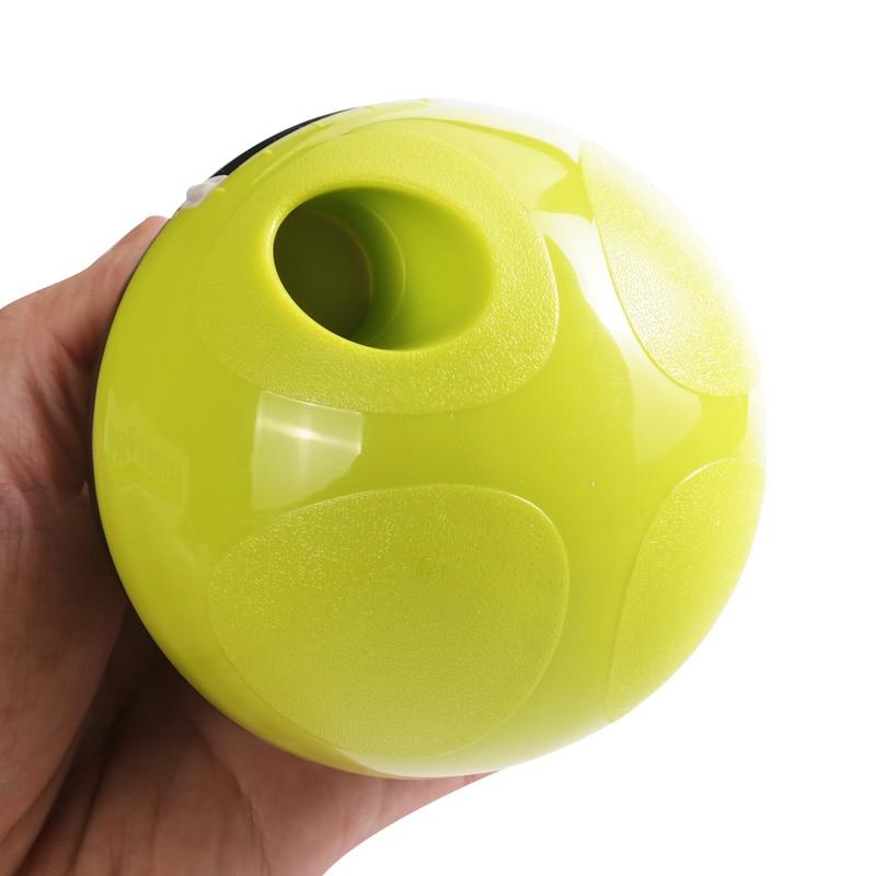 Interactive pet feeding toy showing where the food or treats come out for dogs and cats