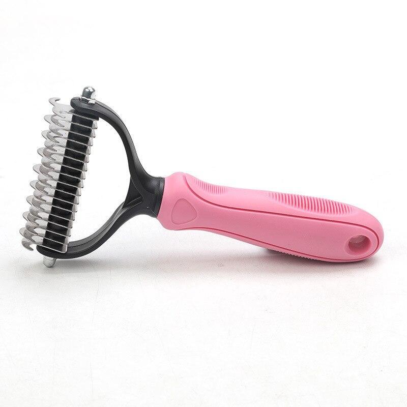 Pink brush designed for grooming pets and removing loose fur