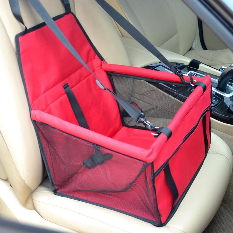 Secure red dog car seat carrier designed for safe travel