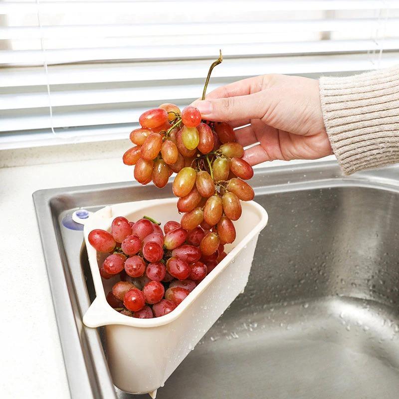 Adjustable sink drain basket keeping grapes fresh while draining