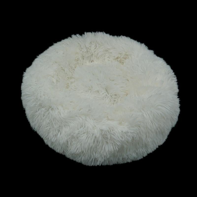 Ultra-soft white pet donut bed for calming and cozy sleeping for dogs and cats